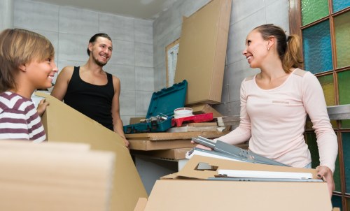 Professional movers handling household items
